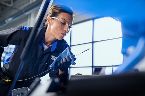 Mechanic servicing a car